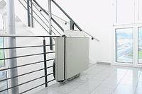 Inclined platform lift closed mid station